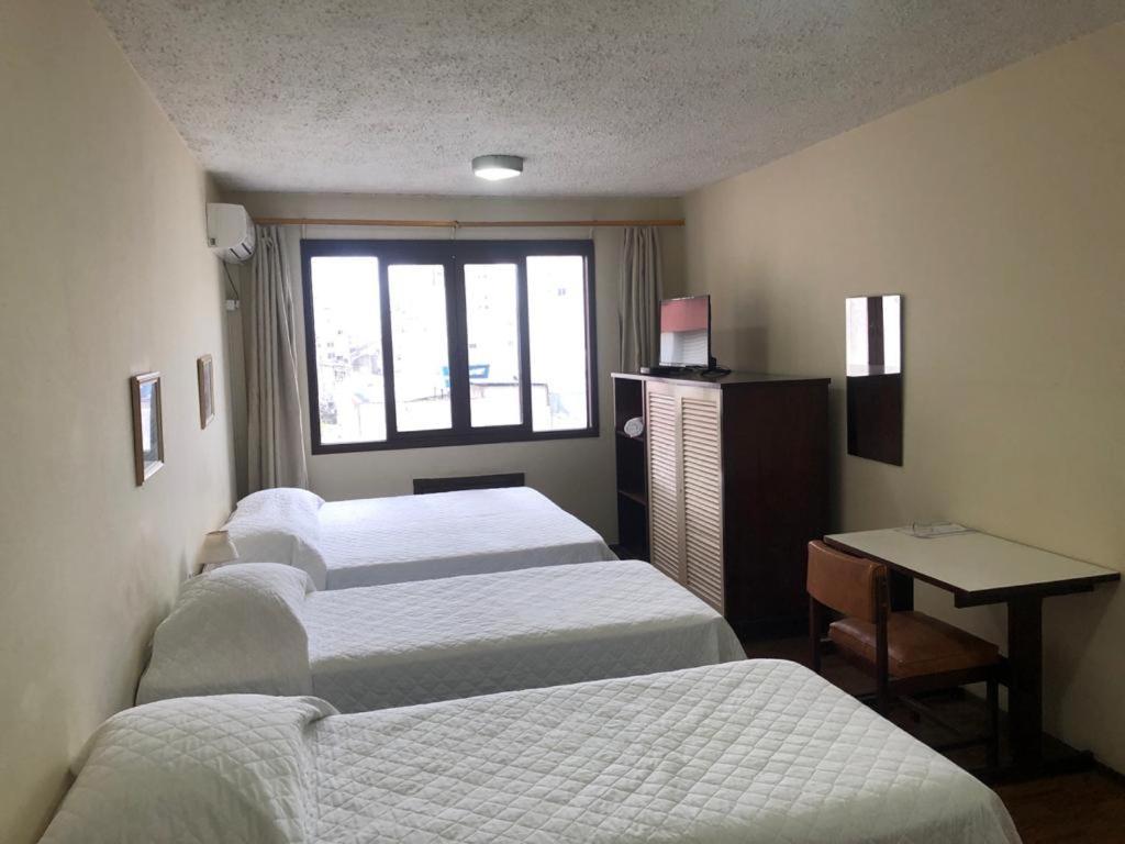 Hotel Estoril Pelotas Bagian luar foto